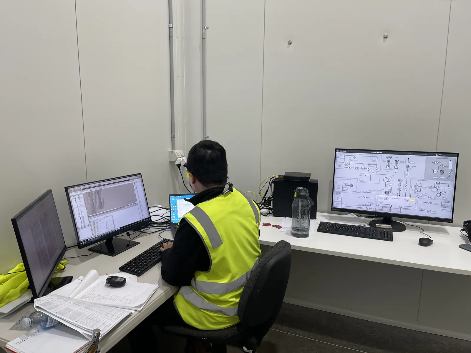 SCADA control room monitoring industrial plant