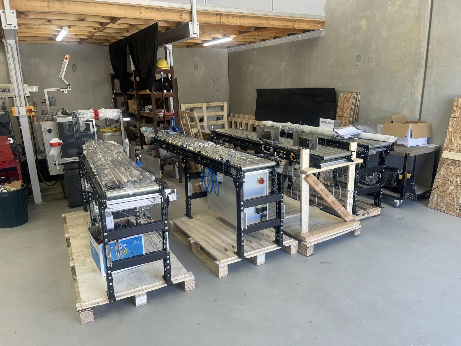 Conveyor system fabrication in Mobile Automation workshop
