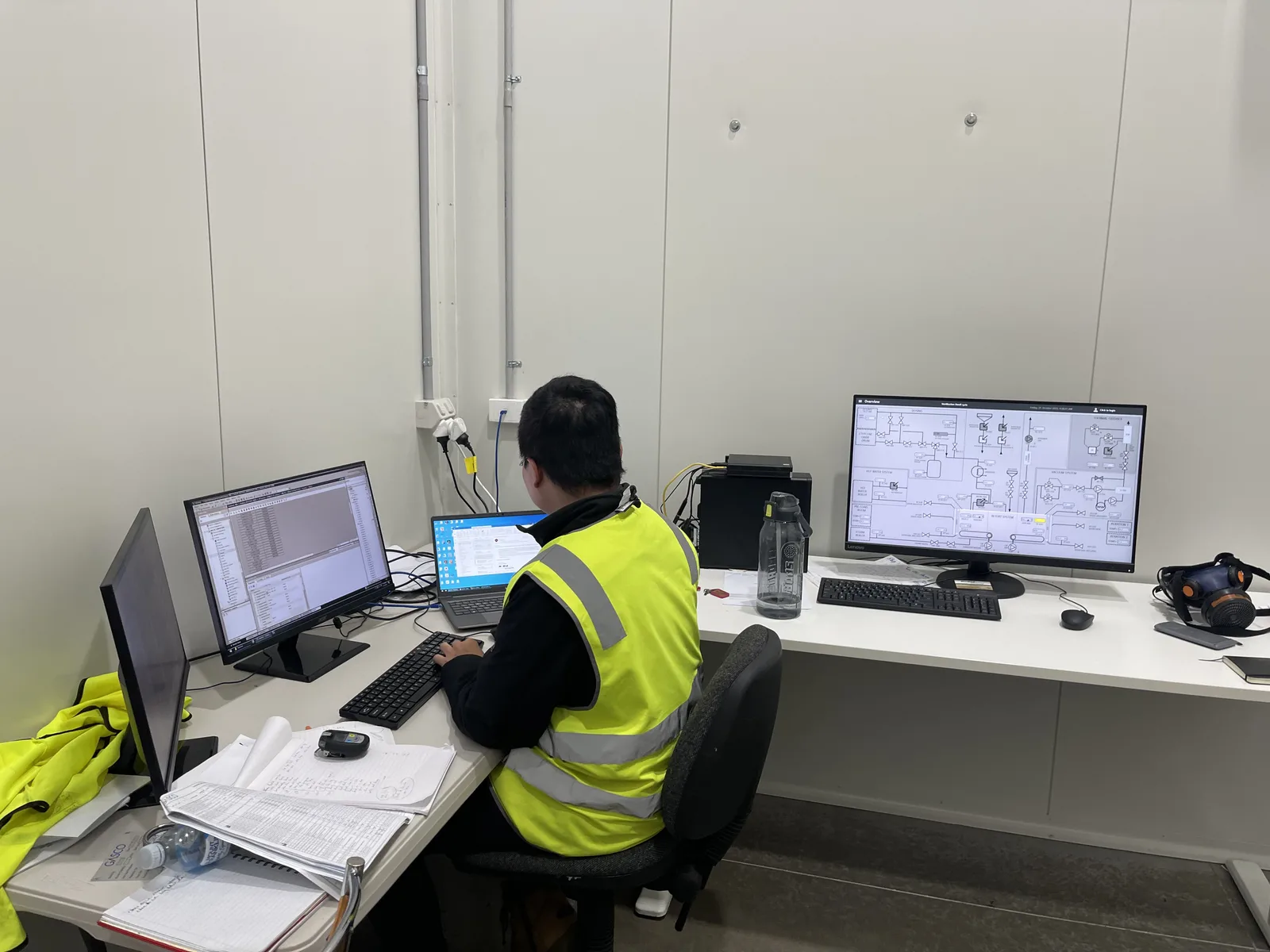 Automation engineer working on SCADA system screens